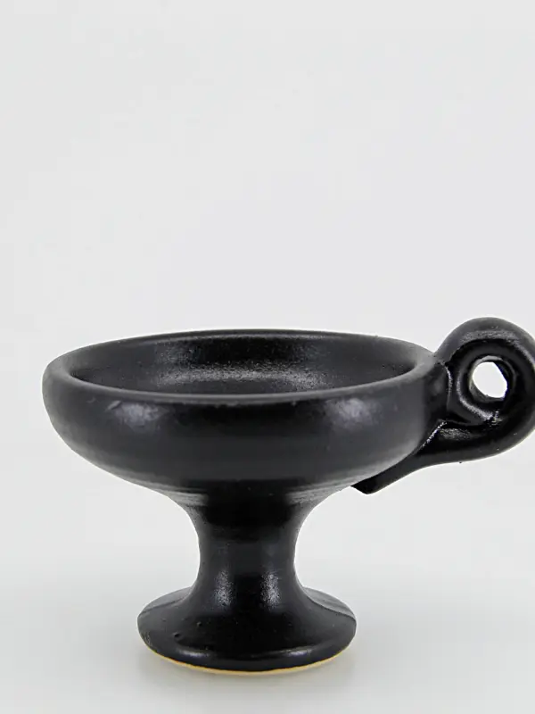 Peça em cerâmica artesanal